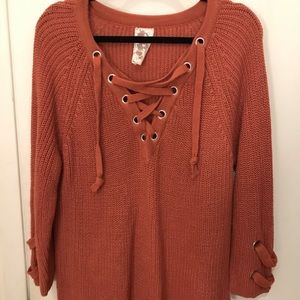 Orange cozy sweater with arm details